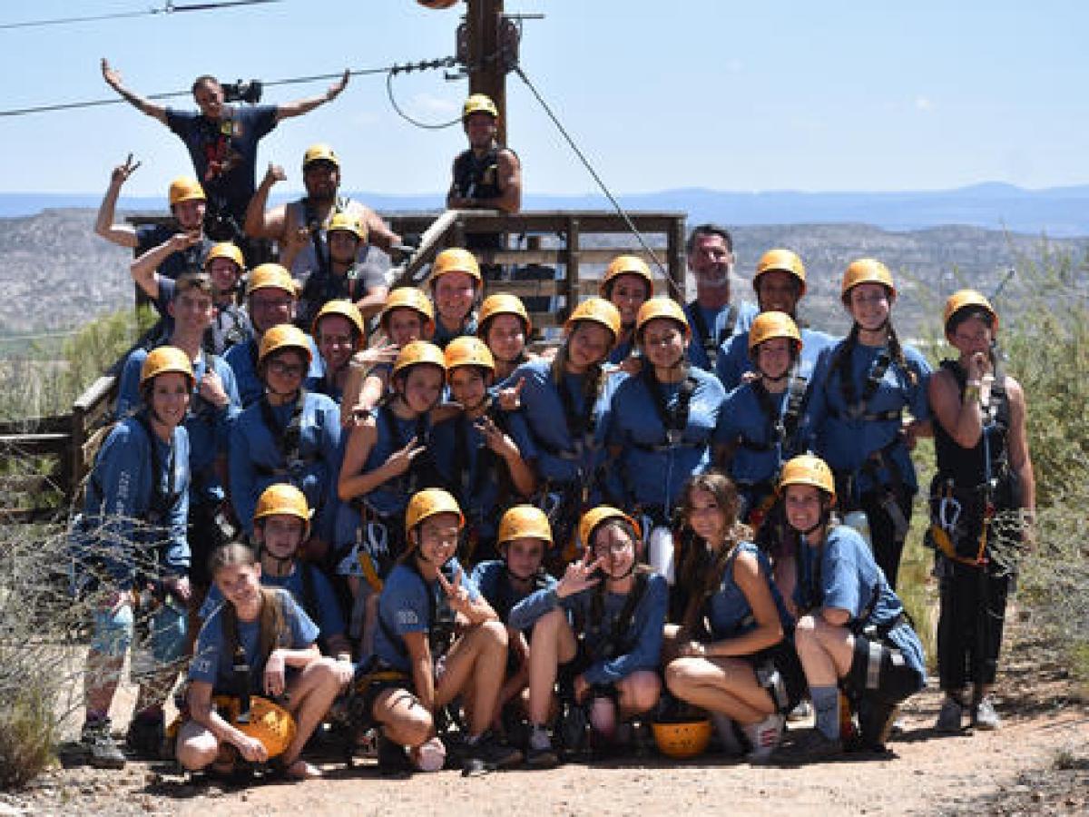 a group of people posing for the camera